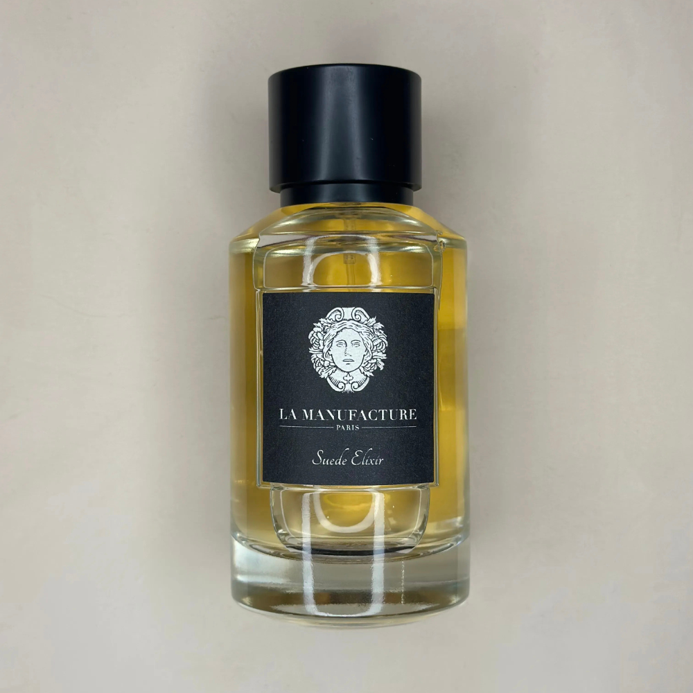 Au centre le flacon du parfum Suède Elixir en 100ml de la marque La Manufacture disponible chez ICI Concept Store