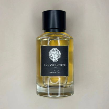 Au centre le flacon du parfum Suède Elixir en 100ml de la marque La Manufacture disponible chez ICI Concept Store 